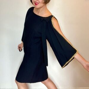 Vintage union made black classy dress with slit angel/ bell sleeves and bow.